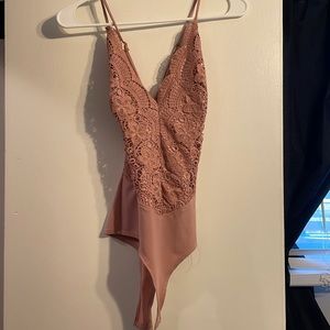 Small pink bodysuit